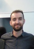  A self-consistent numerical model of internal wave-induced mean flow oscillations in polar geometry